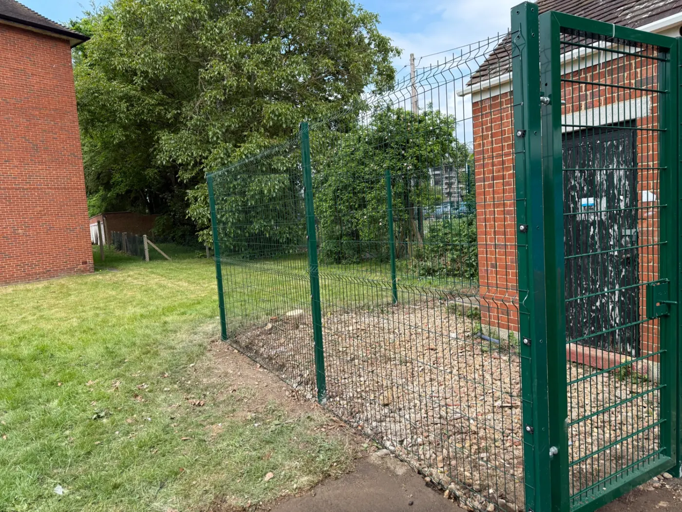 V-mesh commercial security fencing with a lockable gate