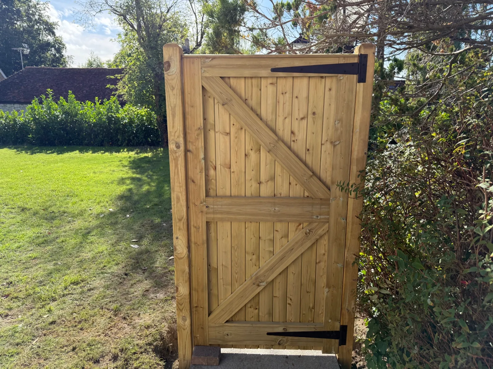 Braced timber garden gate hung on posts